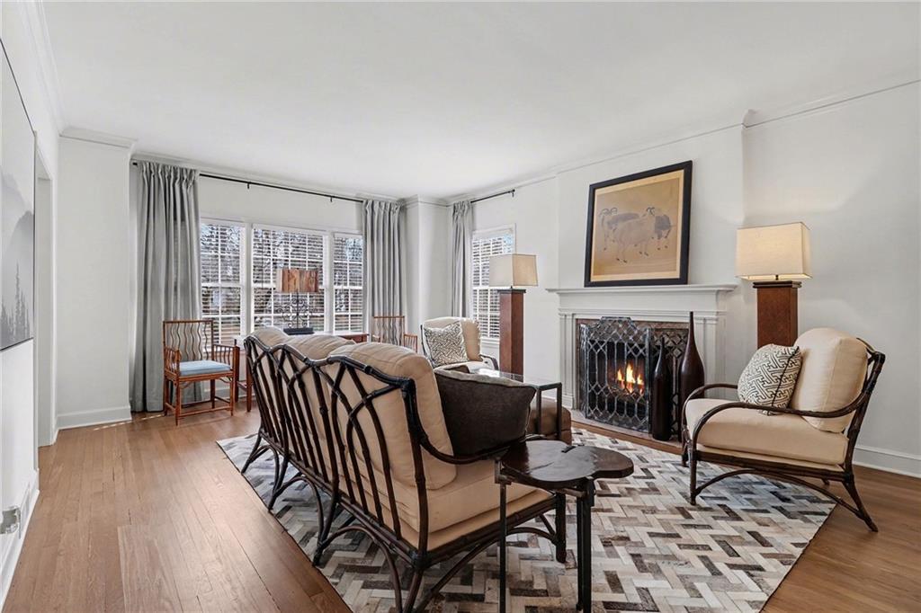 1746 Johnson Road Northeast Atlanta, GA 30306 - Photo 10 of 45 a living room with furniture and a fireplace