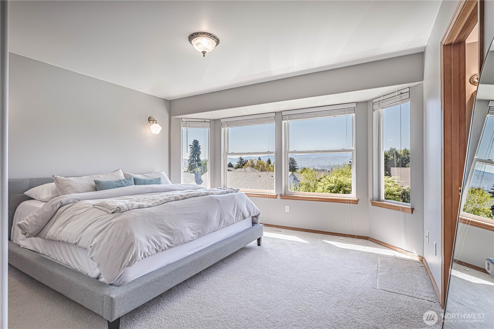 185 Fox Run Wenatchee, WA 98801 - Photo 21 of 39 a bed sitting in a spacious bedroom next to a window