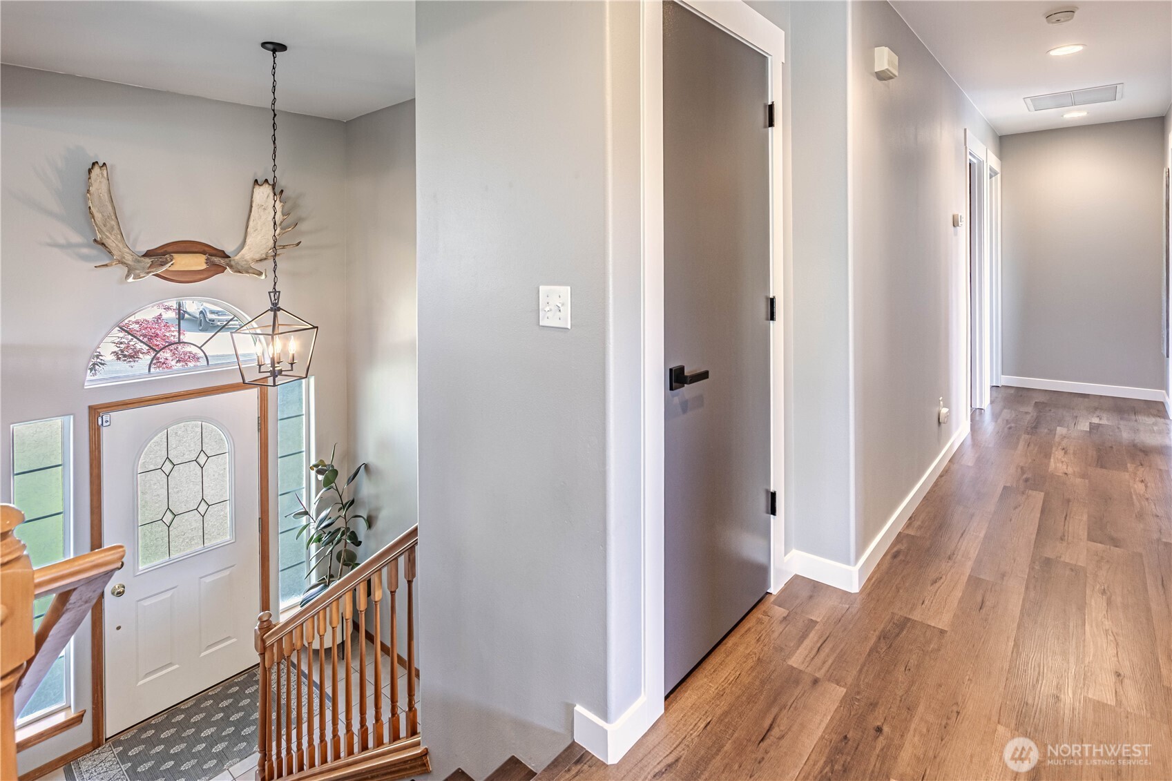 185 Fox Run Wenatchee, WA 98801 - Photo 8 of 39 a view of a hallway and wooden floor with entryway