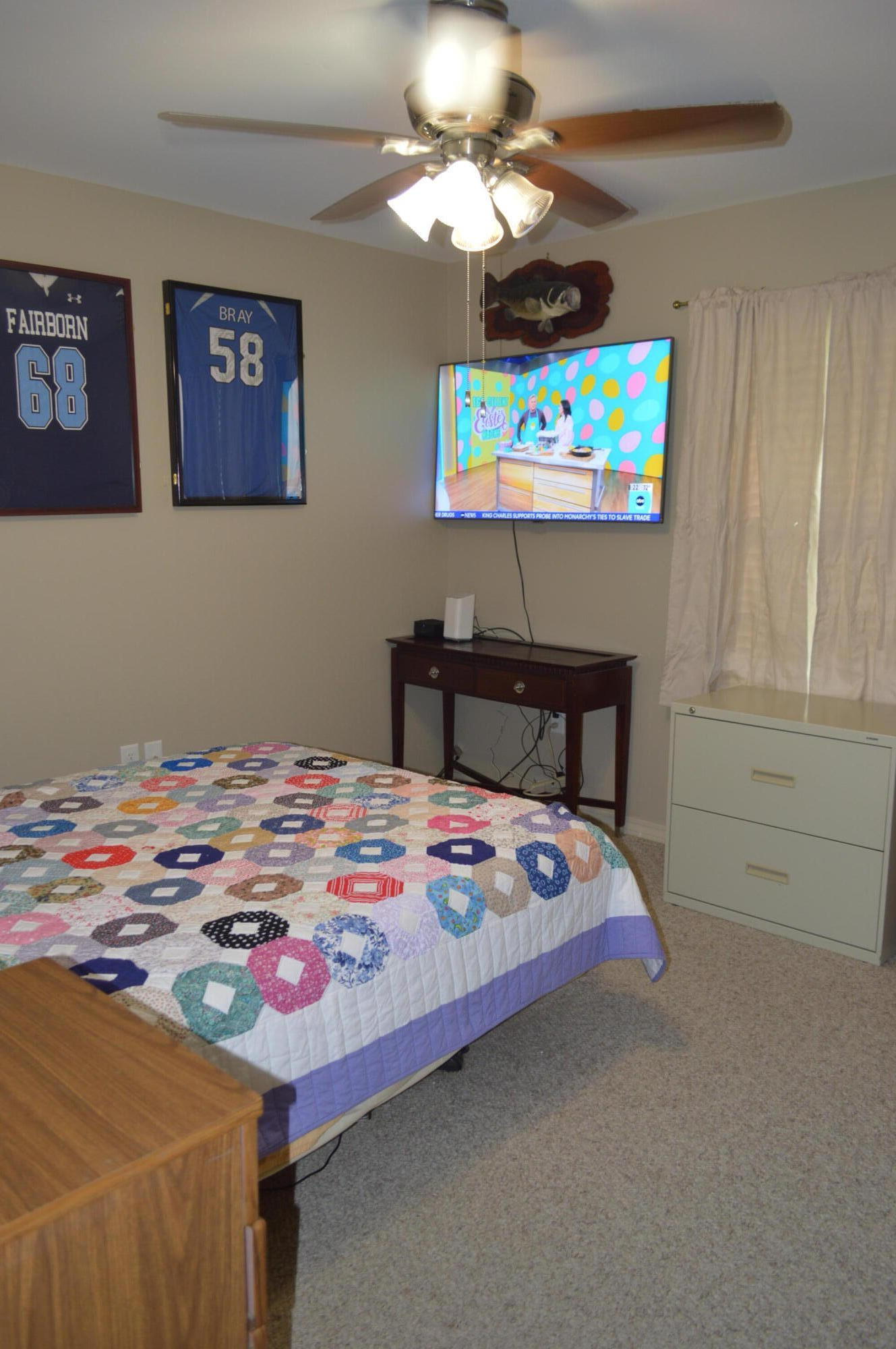 3939 Painter Branch Road Crestview, FL 32539 - Photo 14 of 35 a bedroom with bed and a window