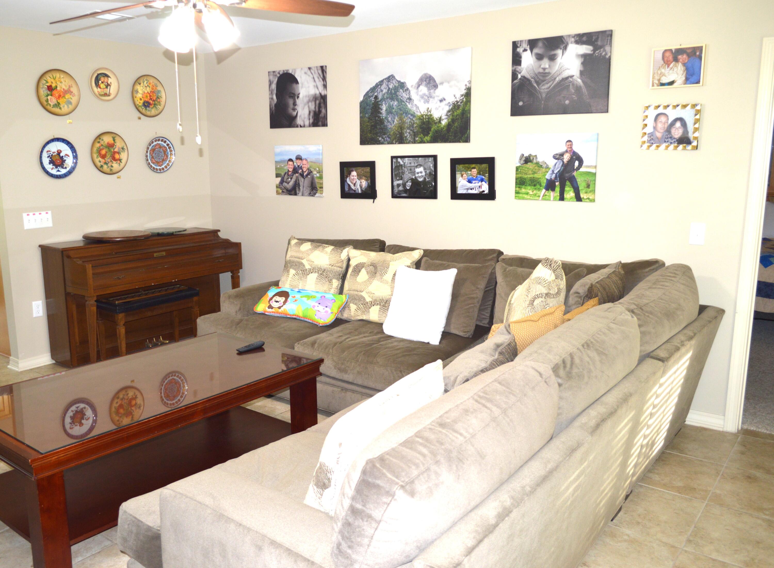 3939 Painter Branch Road Crestview, FL 32539 - Photo 3 of 35 a picture of a couch in a living room with white walls