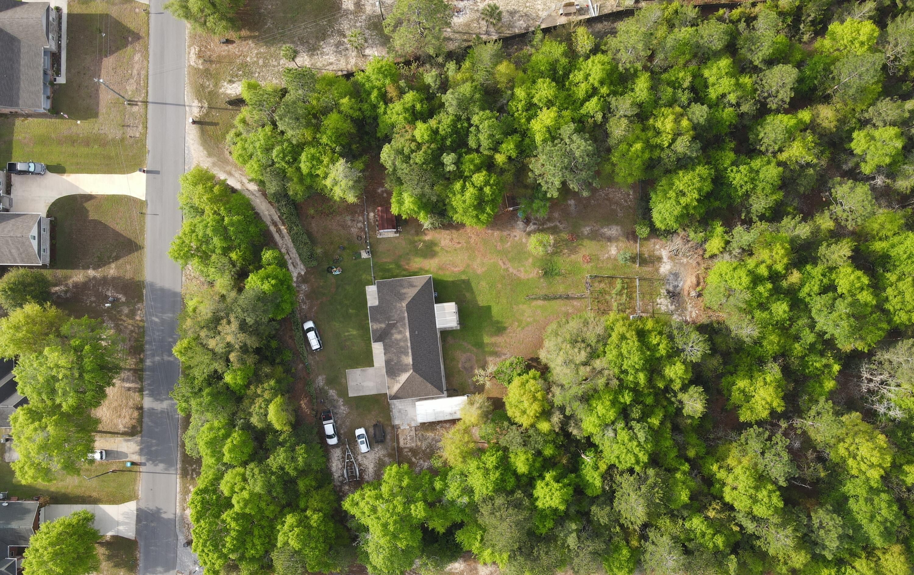 3939 Painter Branch Road Crestview, FL 32539 - Photo 31 of 35 a view of a garden with plants