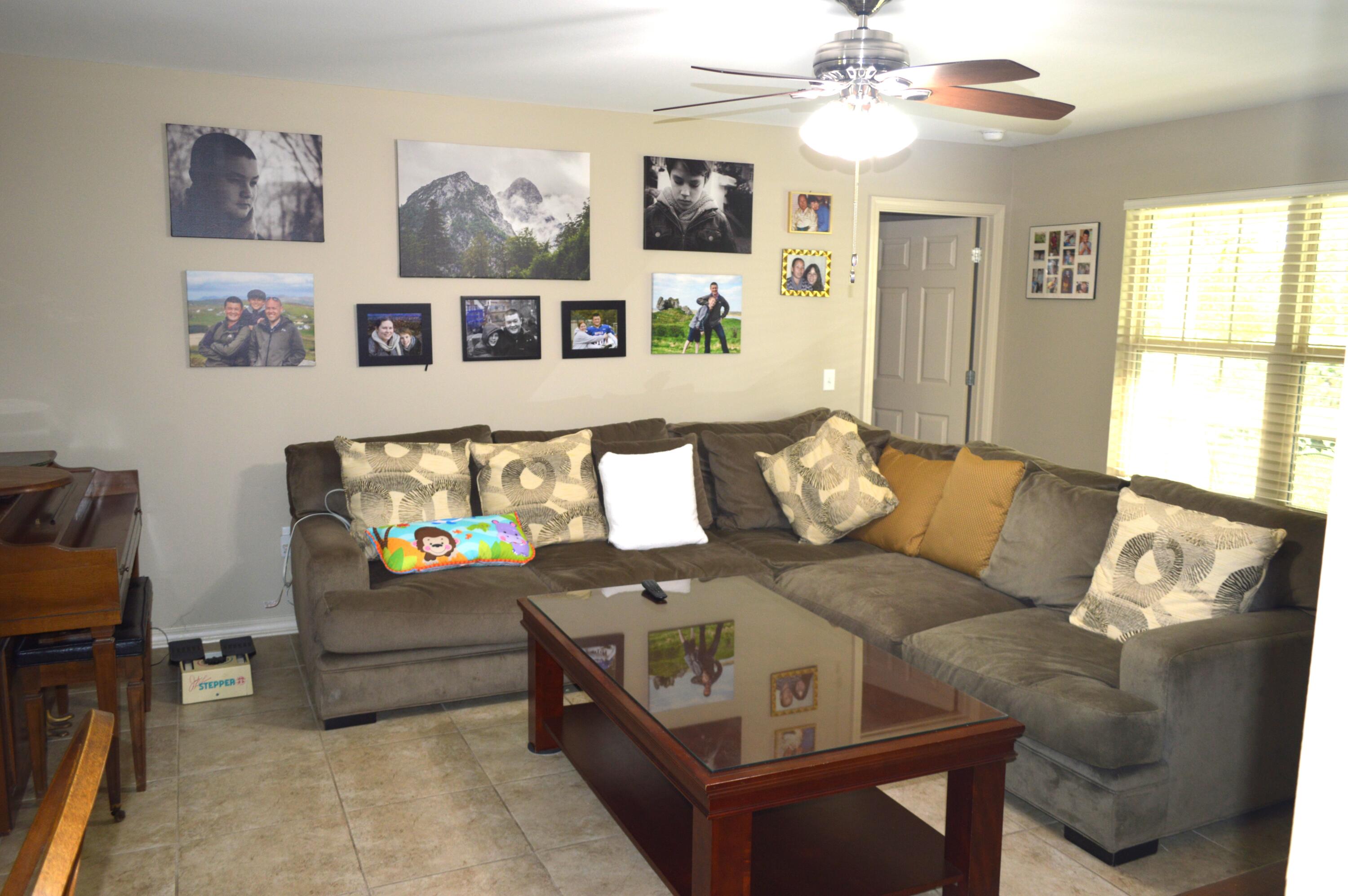 3939 Painter Branch Road Crestview, FL 32539 - Photo 4 of 35 a living room with furniture and a window