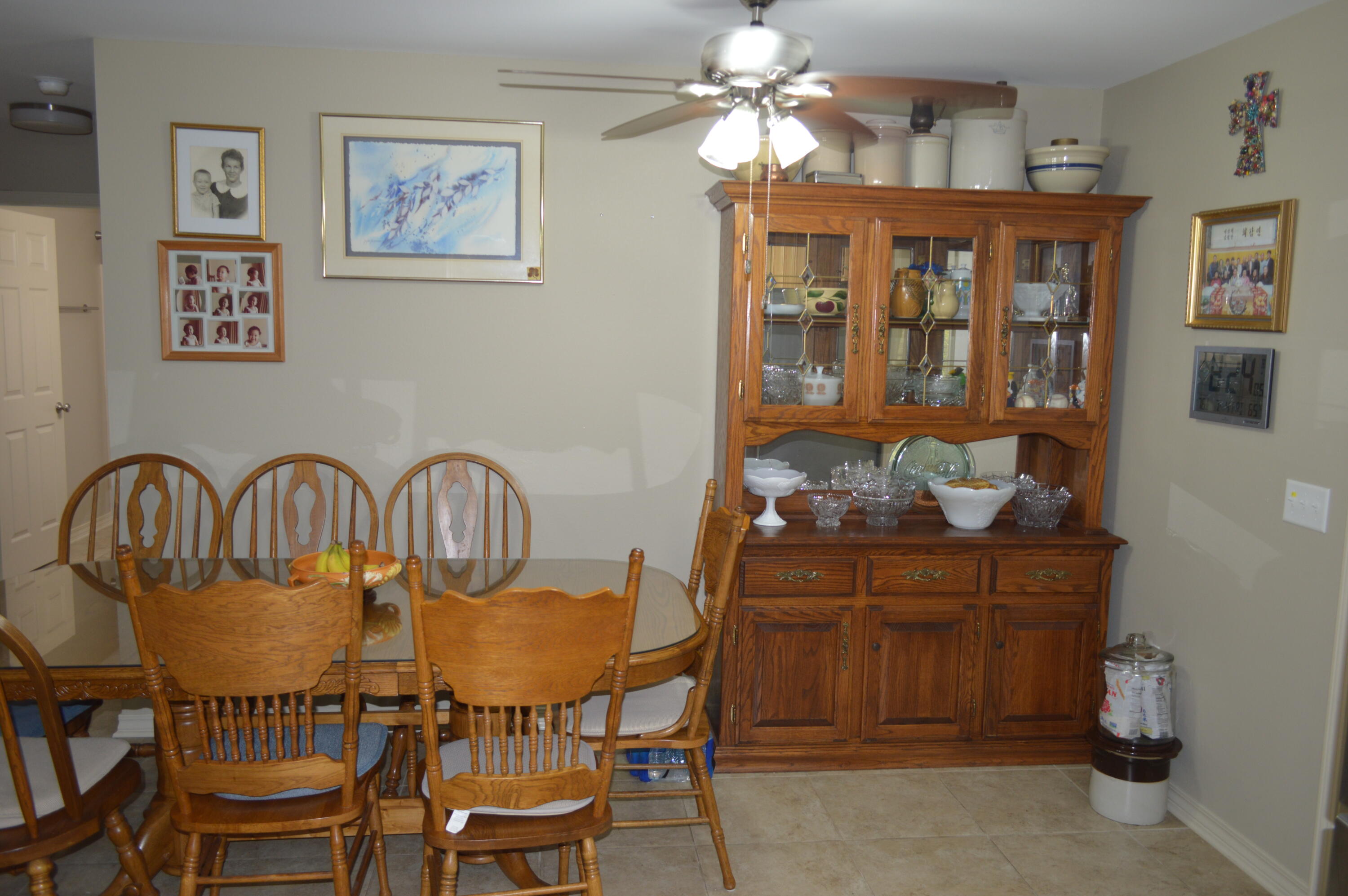 3939 Painter Branch Road Crestview, FL 32539 - Photo 7 of 35 a view of a dining room with furniture and chandelier