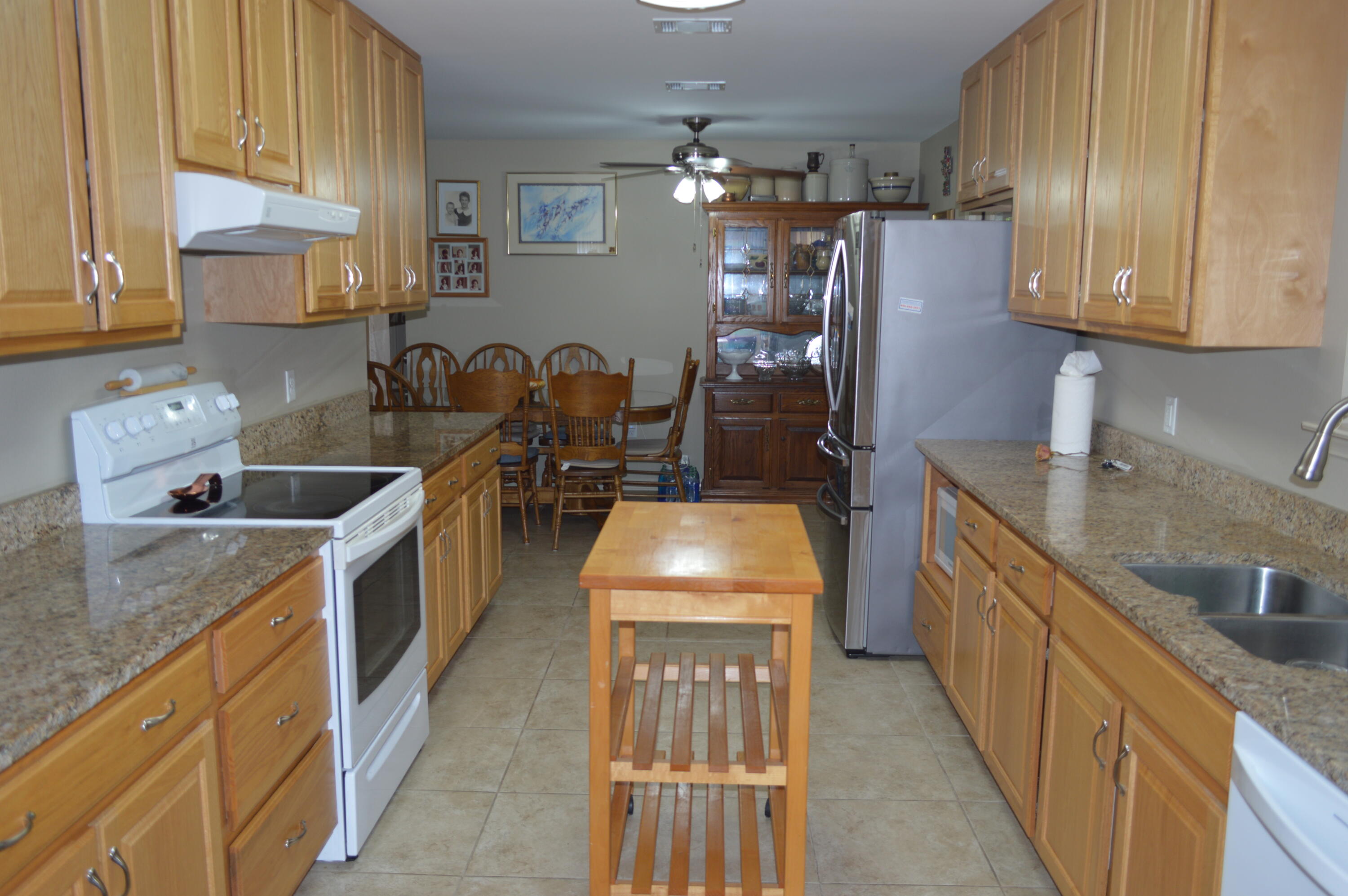 3939 Painter Branch Road Crestview, FL 32539 - Photo 10 of 35 a kitchen that has a lot of cabinets in it