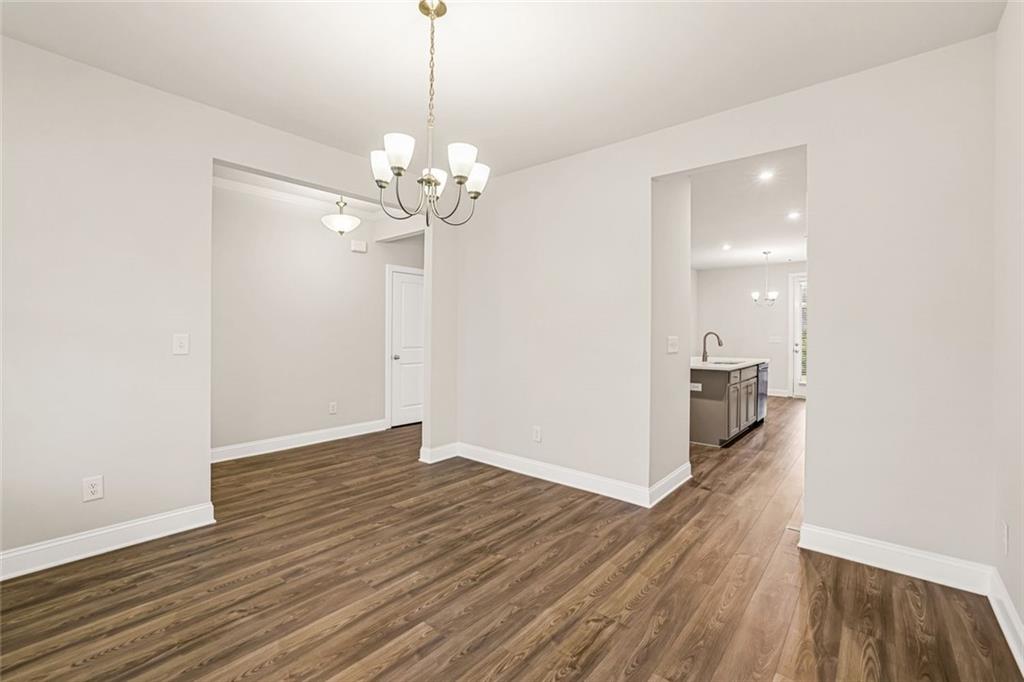 639 Tigers Eye Terrace Kennesaw, GA 30144 - Photo 11 of 36 a view of a chandelier in a room