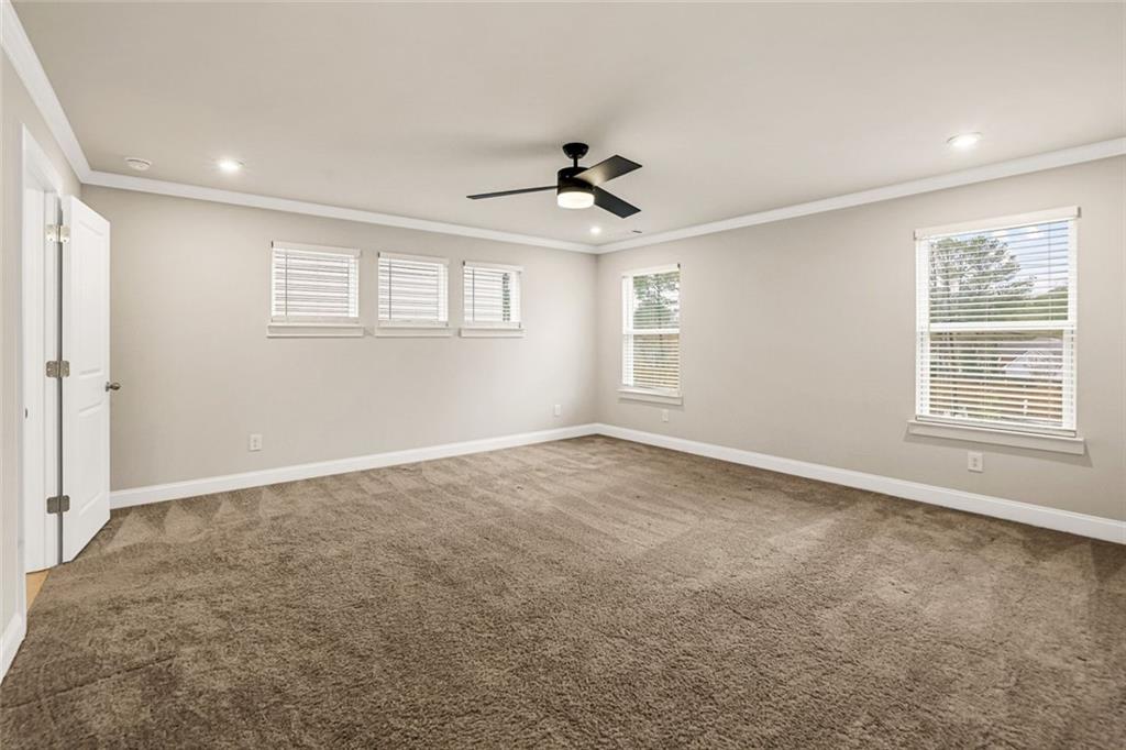 639 Tigers Eye Terrace Kennesaw, GA 30144 - Photo 28 of 36 a view of an empty room with a window