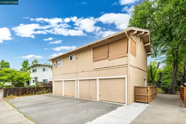 a view of a house with a garage