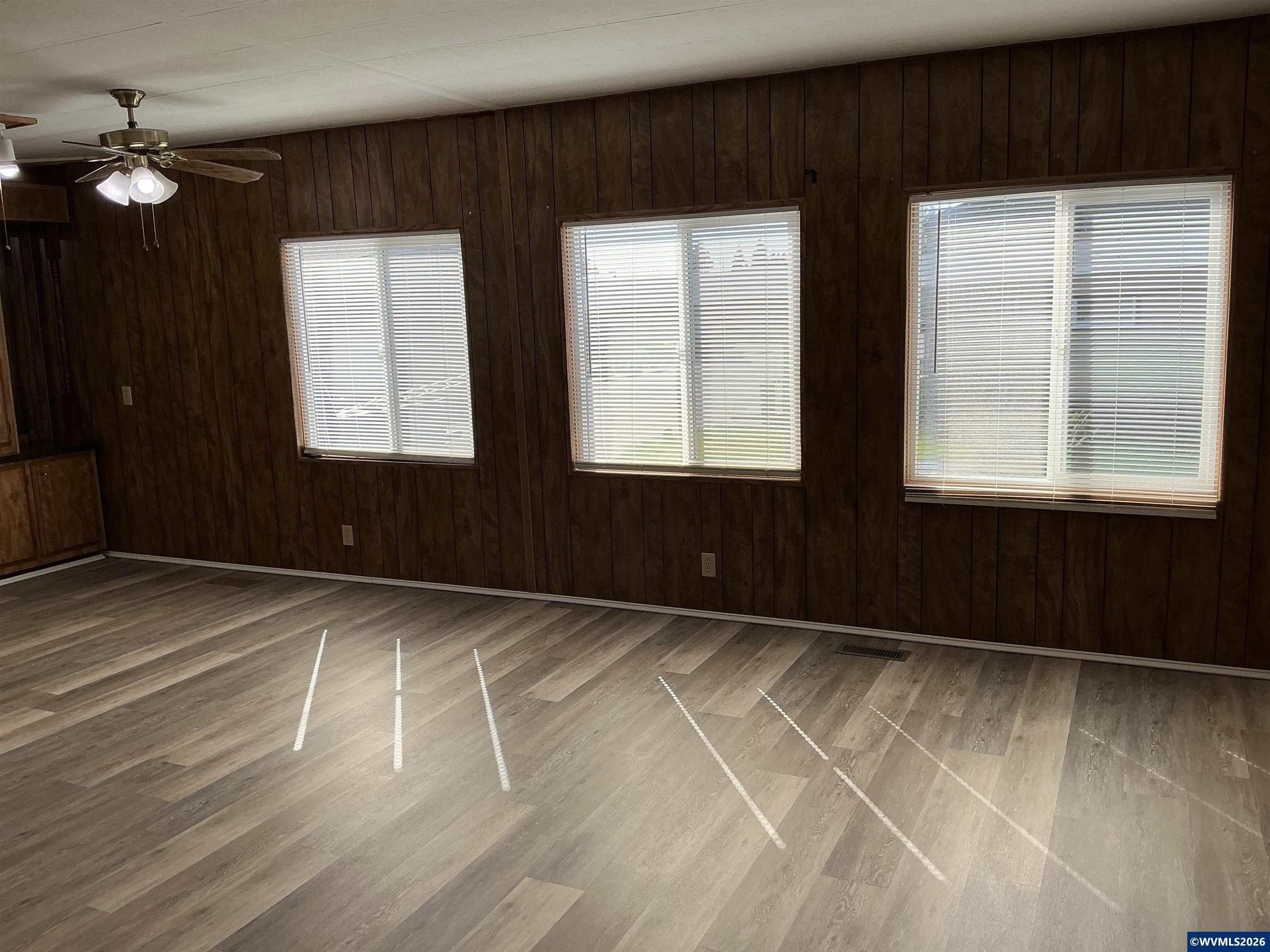 5422 Portland Road Northeast, Unit 67 Salem, OR 97305 - Photo 21 of 45 a view of an empty room with a window