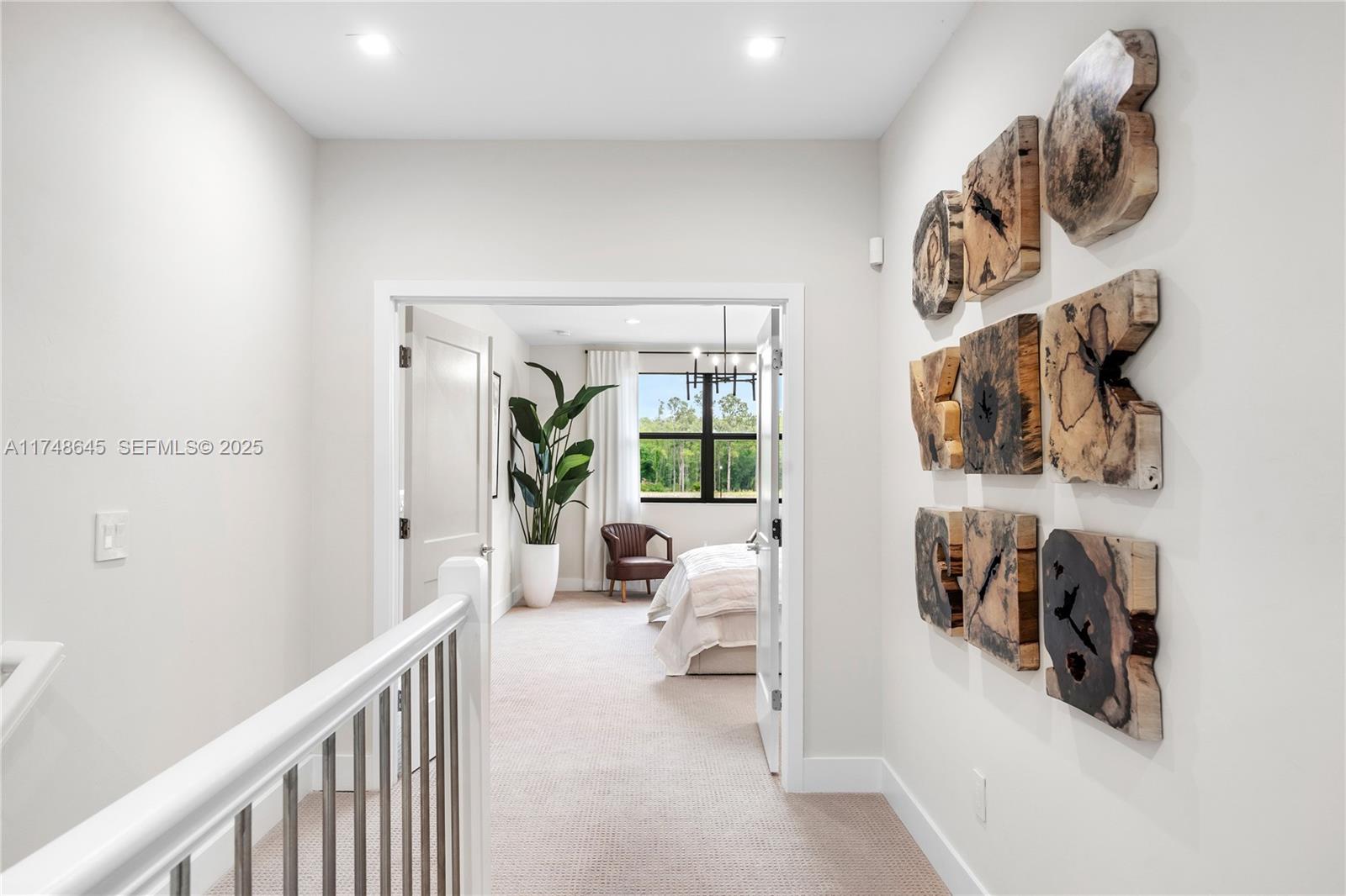 10951 Salt Bay Way Fort Myers, FL 33913 - Photo 14 of 34 a view of a hallway with white walls and white walls