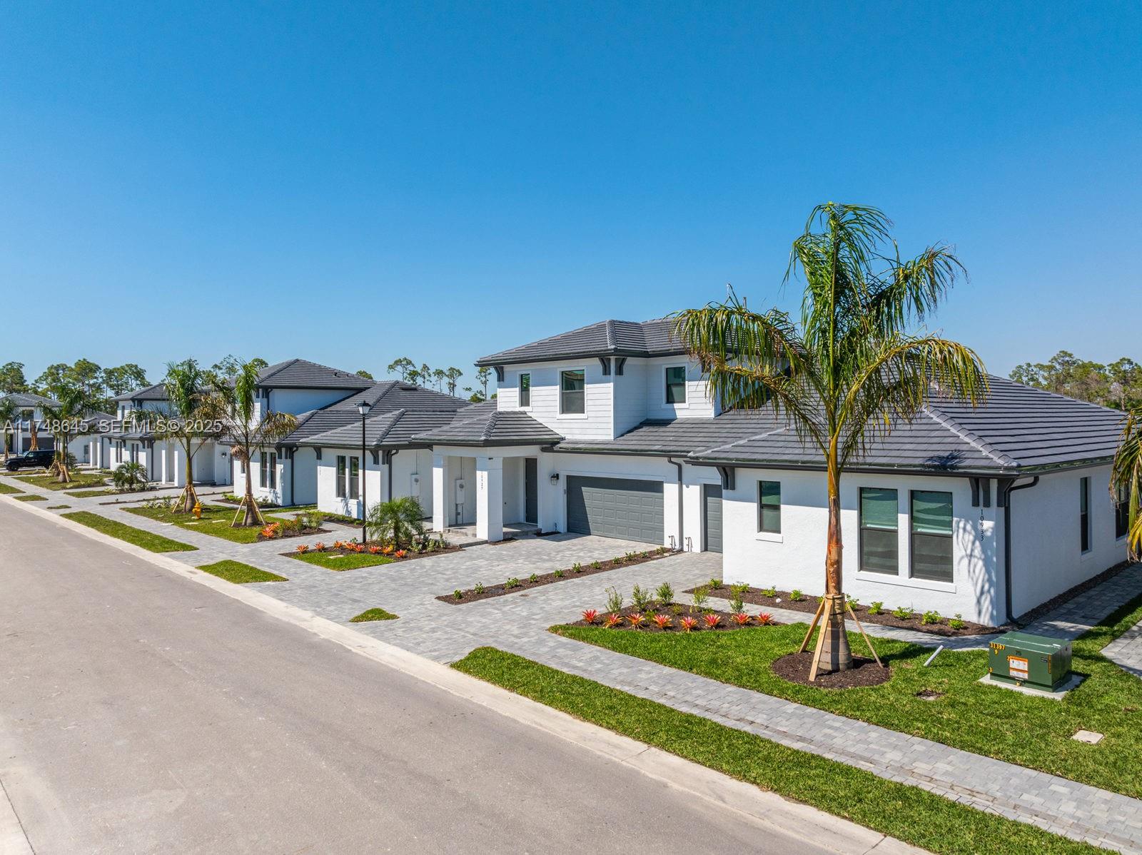 10951 Salt Bay Way Fort Myers, FL 33913 - Photo 34 of 34 a front view of a house with a yard