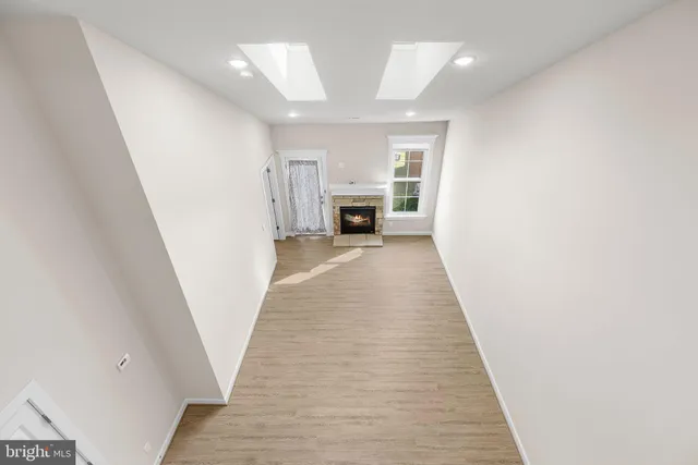 a view of a building with a yard