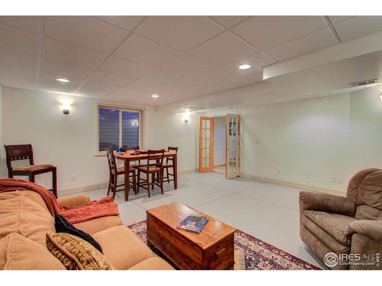 841 Durum Street Windsor, CO 80550 - Photo 23 of 24 a living room with furniture