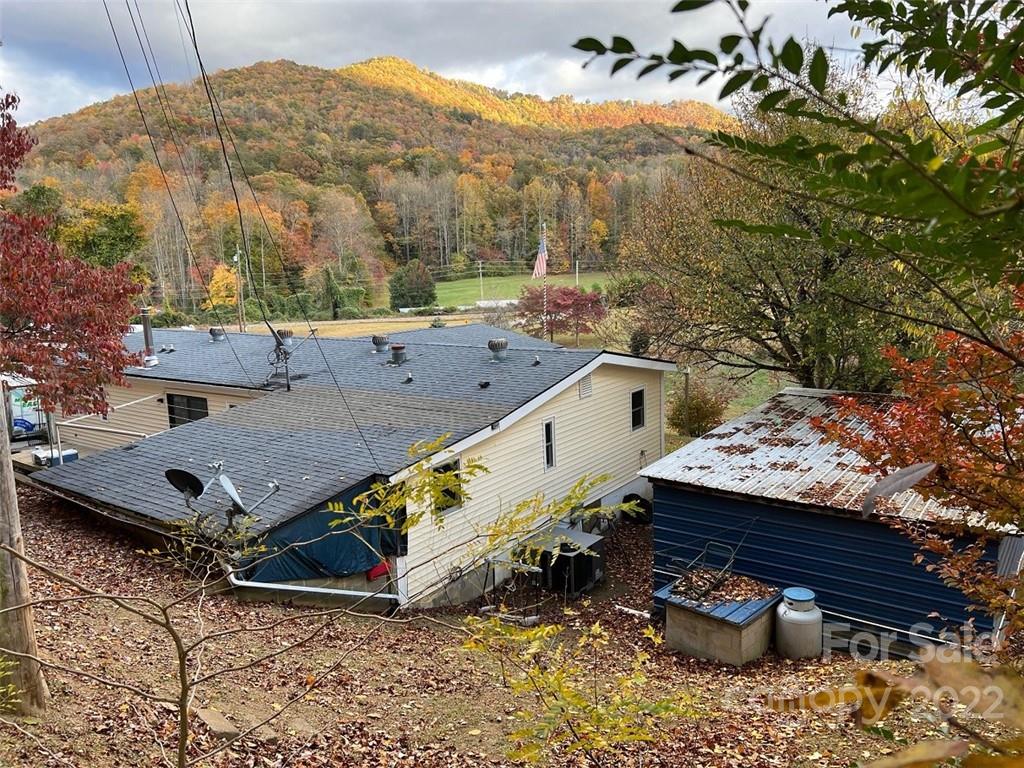 396 Jacobs Road Bryson City, NC 28713 - Photo 39 of 43 a view of a house with a yard and sitting area