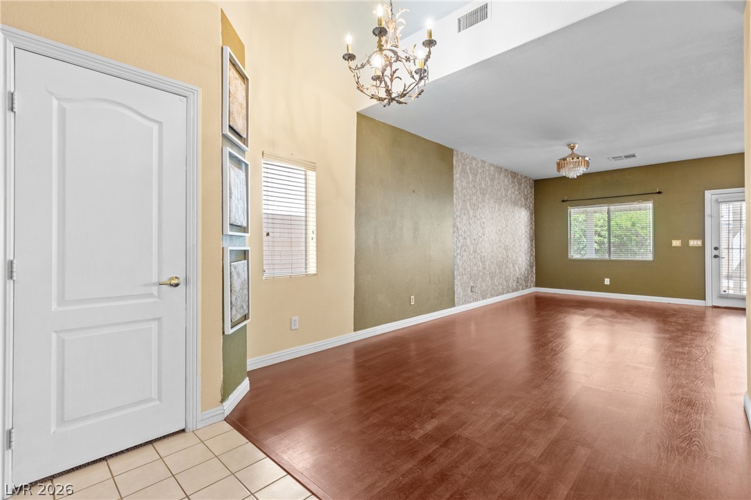 8934 Deep Ridge Court Las Vegas, NV 89178 - Photo 6 of 47 The soaring vaulted ceilings and rich wood flooring create an impressive, luminous living space.
