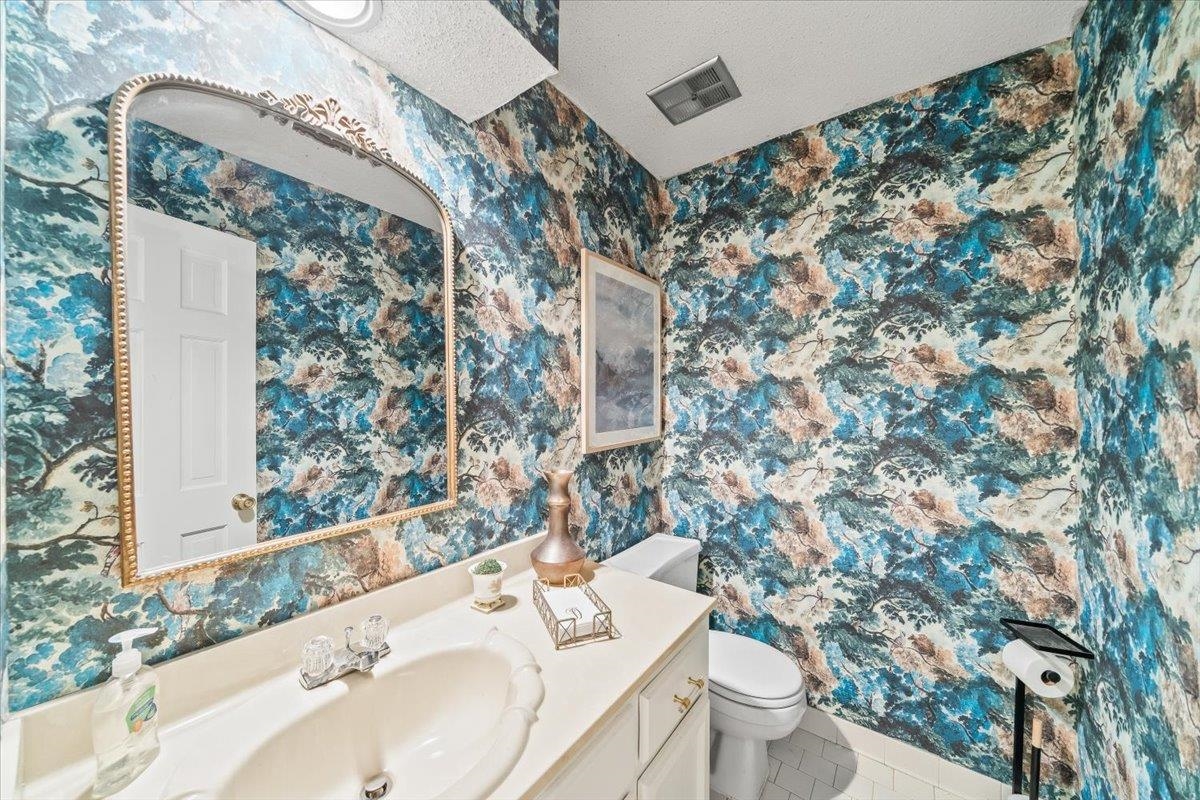 8417 Bazemore Road Memphis, TN 38018 - Photo 18 of 39 a bathroom with a sink toilet and shower