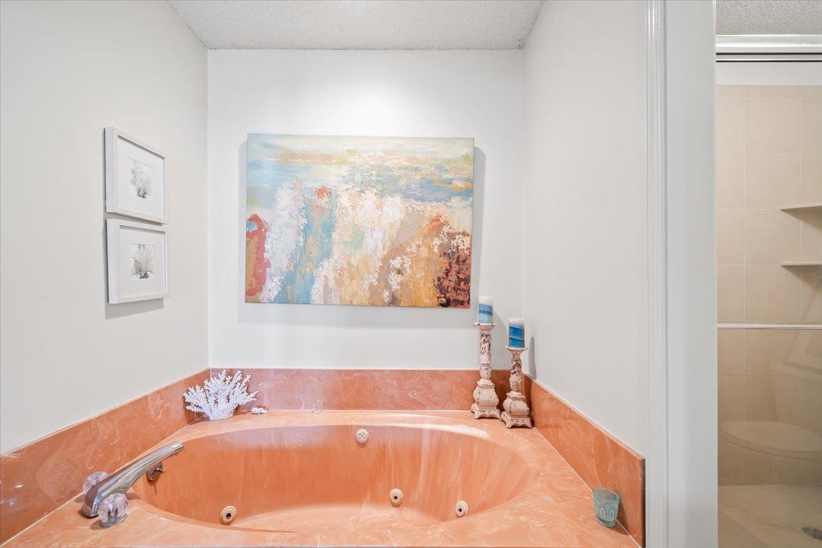 8417 Bazemore Road Memphis, TN 38018 - Photo 21 of 39 a bath tub sitting next to a white sink