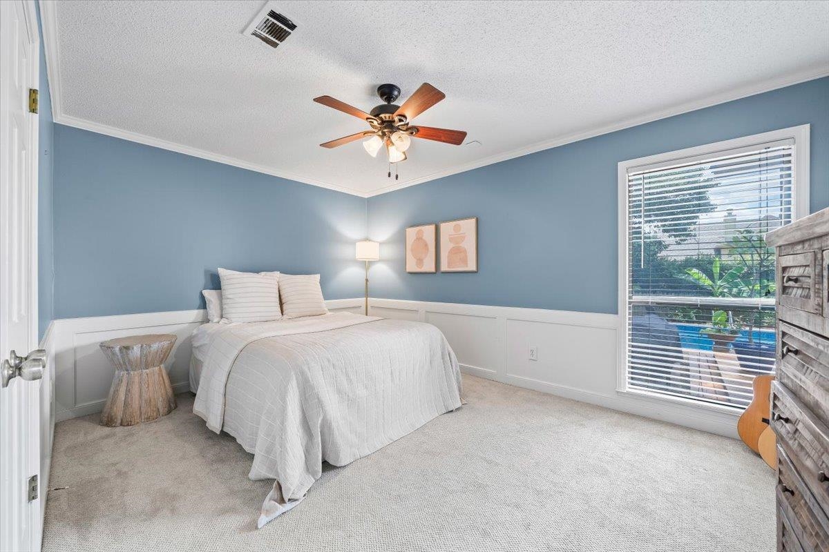 8417 Bazemore Road Memphis, TN 38018 - Photo 22 of 39 a bed room with a bed and a window