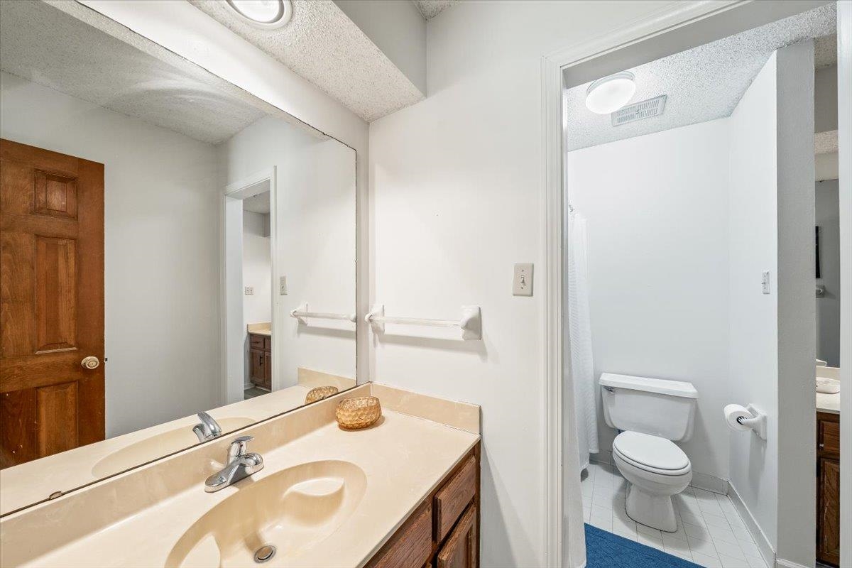 8417 Bazemore Road Memphis, TN 38018 - Photo 26 of 39 a bathroom with a sink toilet and shower