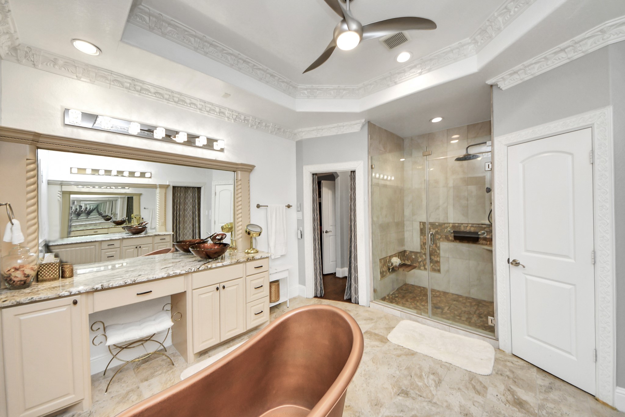 11503 Renaissance Drive Montgomery, TX 77356 - Photo 20 of 50 Luxurious spa-like primary bathroom with soaking tub and spacious zero-entry walk-in tiled shower.