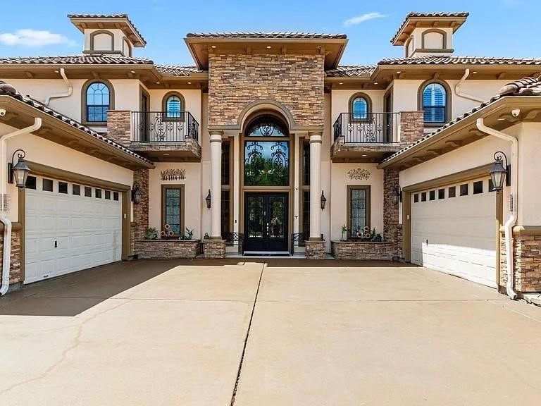 11503 Renaissance Drive Montgomery, TX 77356 - Photo 2 of 50 This gorgeous home includes four balconies and extensive panoramic views.