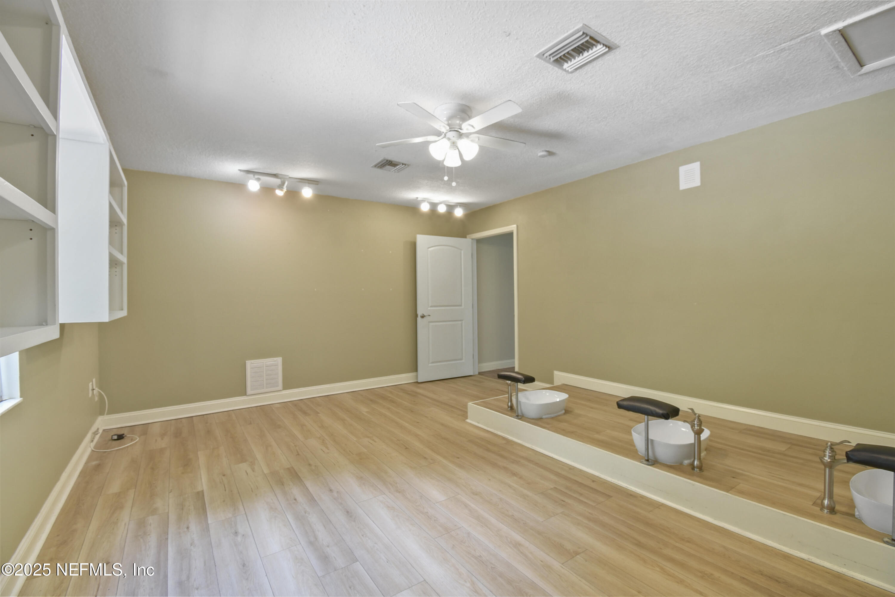 2706 Old Moultrie Road St. Augustine, FL 32086 - Photo 13 of 31 a bathroom with a sink and a mirror