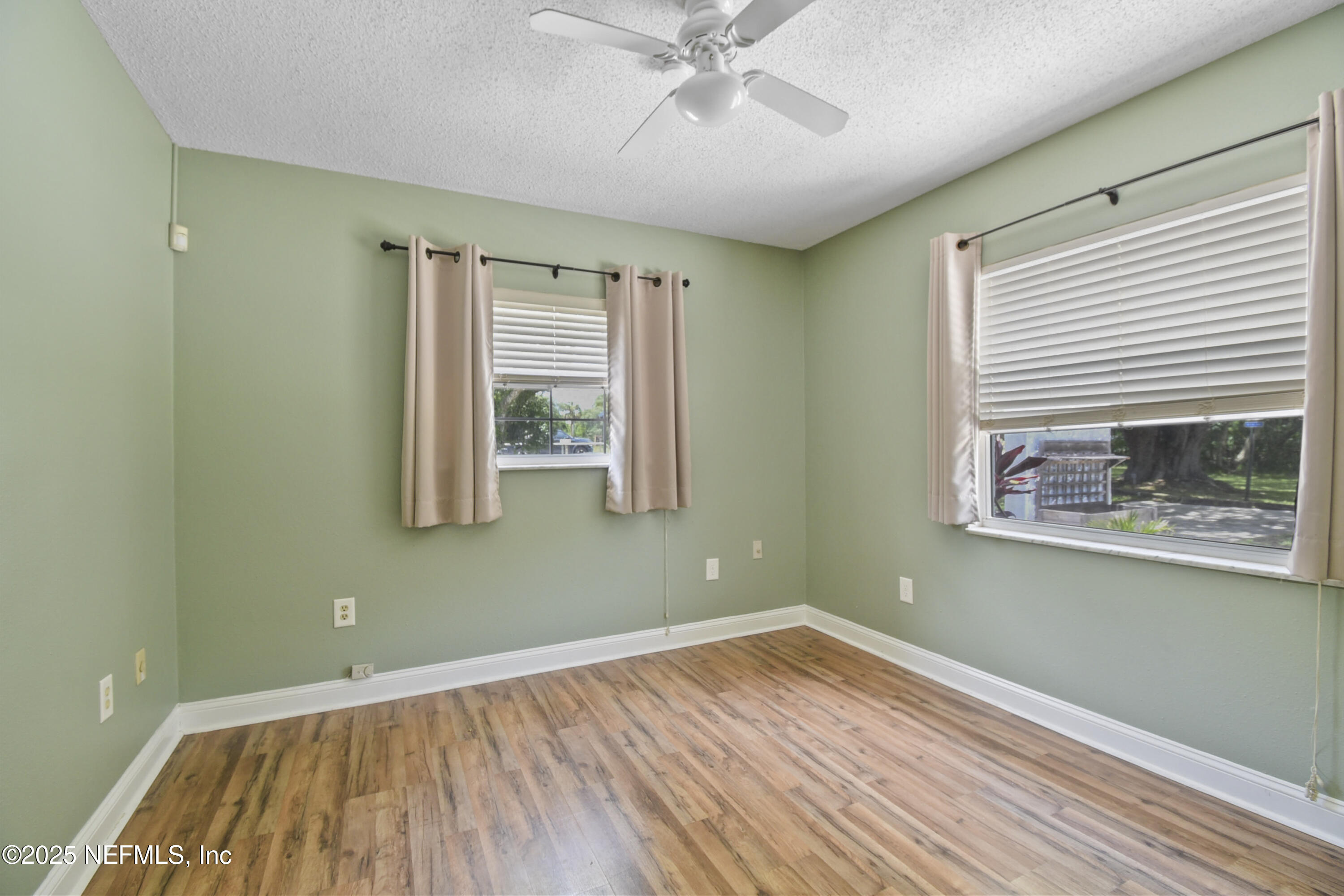 2706 Old Moultrie Road St. Augustine, FL 32086 - Photo 15 of 31 a view of a room with wooden floor and window