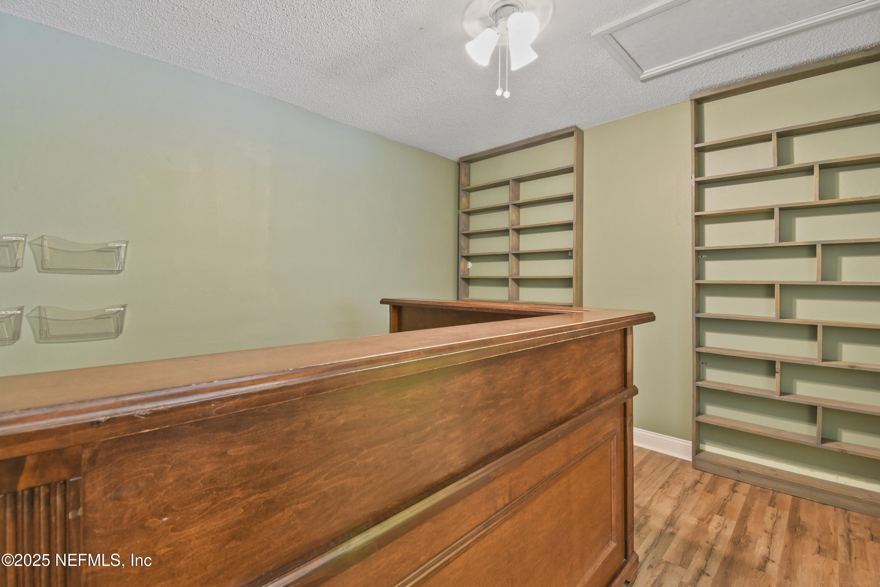 2706 Old Moultrie Road St. Augustine, FL 32086 - Photo 3 of 31 a view of walk in closet with empty racks