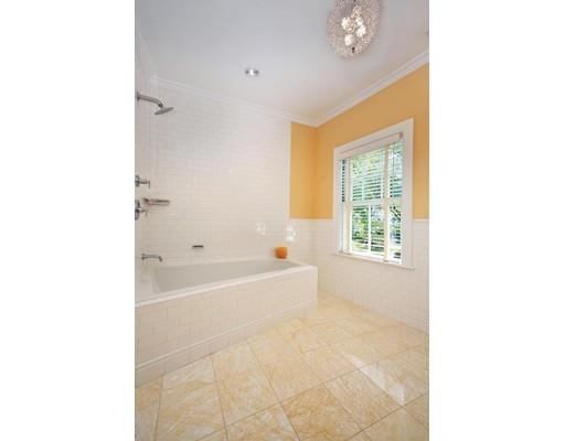 145 Middlesex Road Brookline, MA 02467 - Photo 12 of 25 a bathroom with a bathtub and shower