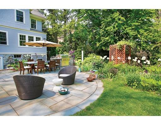 145 Middlesex Road Brookline, MA 02467 - Photo 17 of 25 a view of a backyard with sitting area and garden