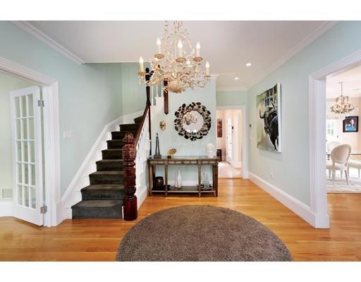145 Middlesex Road Brookline, MA 02467 - Photo 2 of 25 a view of entryway livingroom and hall with wooden floor