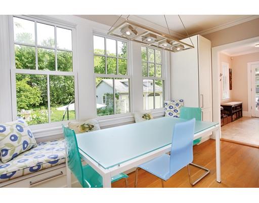 145 Middlesex Road Brookline, MA 02467 - Photo 6 of 25 a living room with furniture and a large window