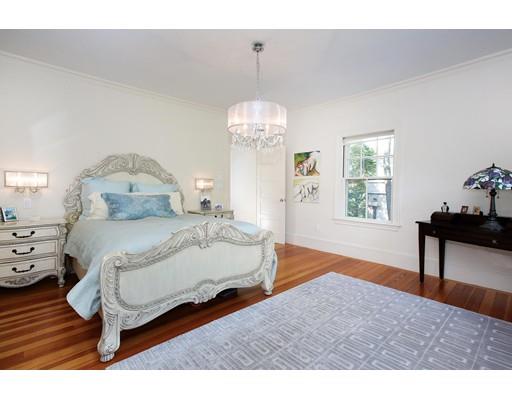 145 Middlesex Road Brookline, MA 02467 - Photo 8 of 25 a bedroom with a bed and a window
