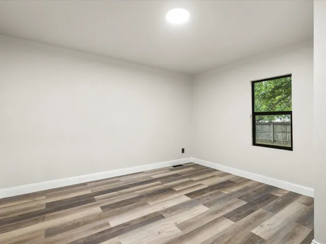 a view of a room that has a window