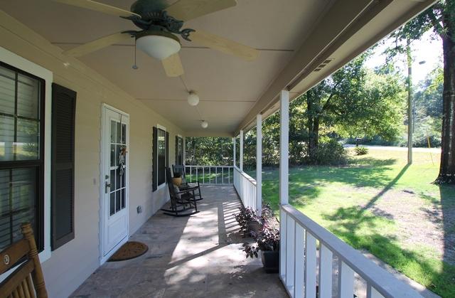 223 Ridge Lake Road Crestview, FL 32536 - Photo 2 of 40 a view of a porch with hardwood