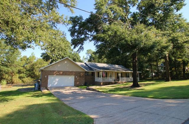 223 Ridge Lake Road Crestview, FL 32536 - Photo 14 of 40 a front view of house with yard and green space