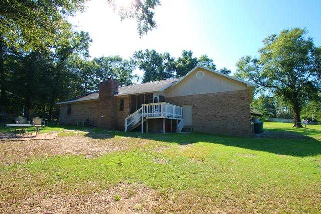 223 Ridge Lake Road Crestview, FL 32536 - Photo 26 of 40 a front view of house with yard and trees