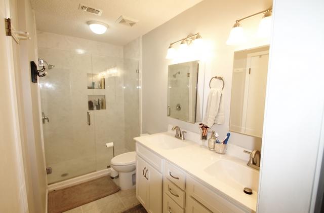 223 Ridge Lake Road Crestview, FL 32536 - Photo 9 of 40 a bathroom with a sink a toilet and shower