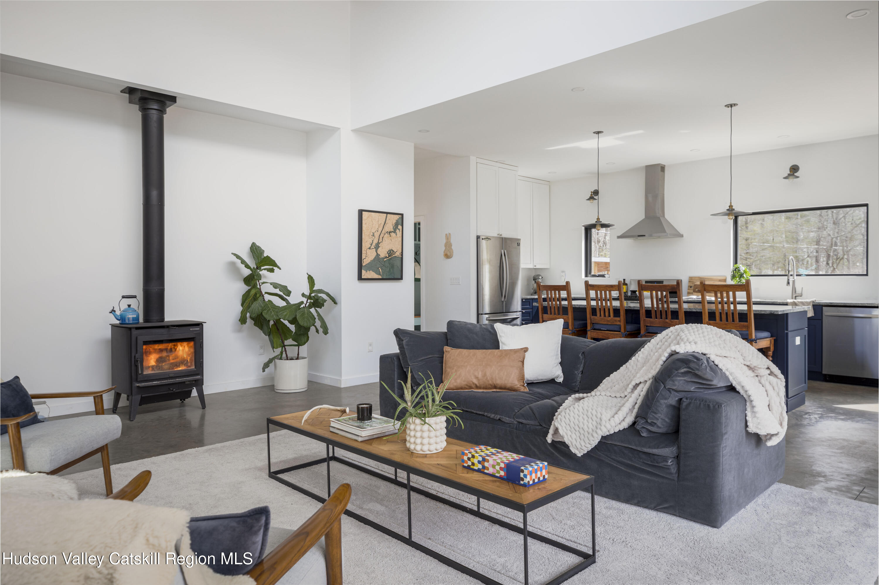 23 Traver Hollow Road Boiceville, NY 12412 - Photo 13 of 48 a living room with furniture kitchen view and a potted plant