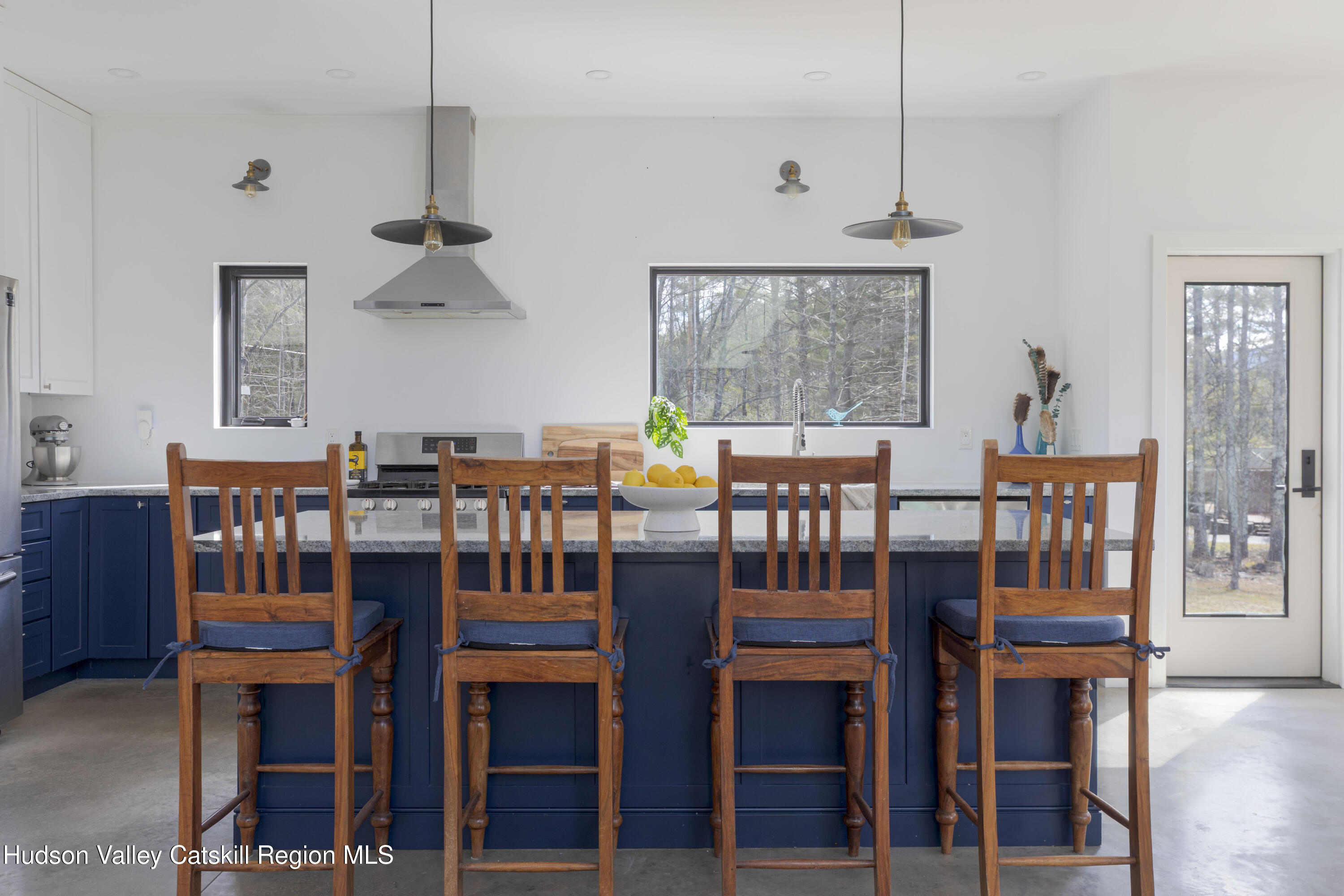 23 Traver Hollow Road Boiceville, NY 12412 - Photo 14 of 48 a view of a dining room with furniture wooden floor and chandelier