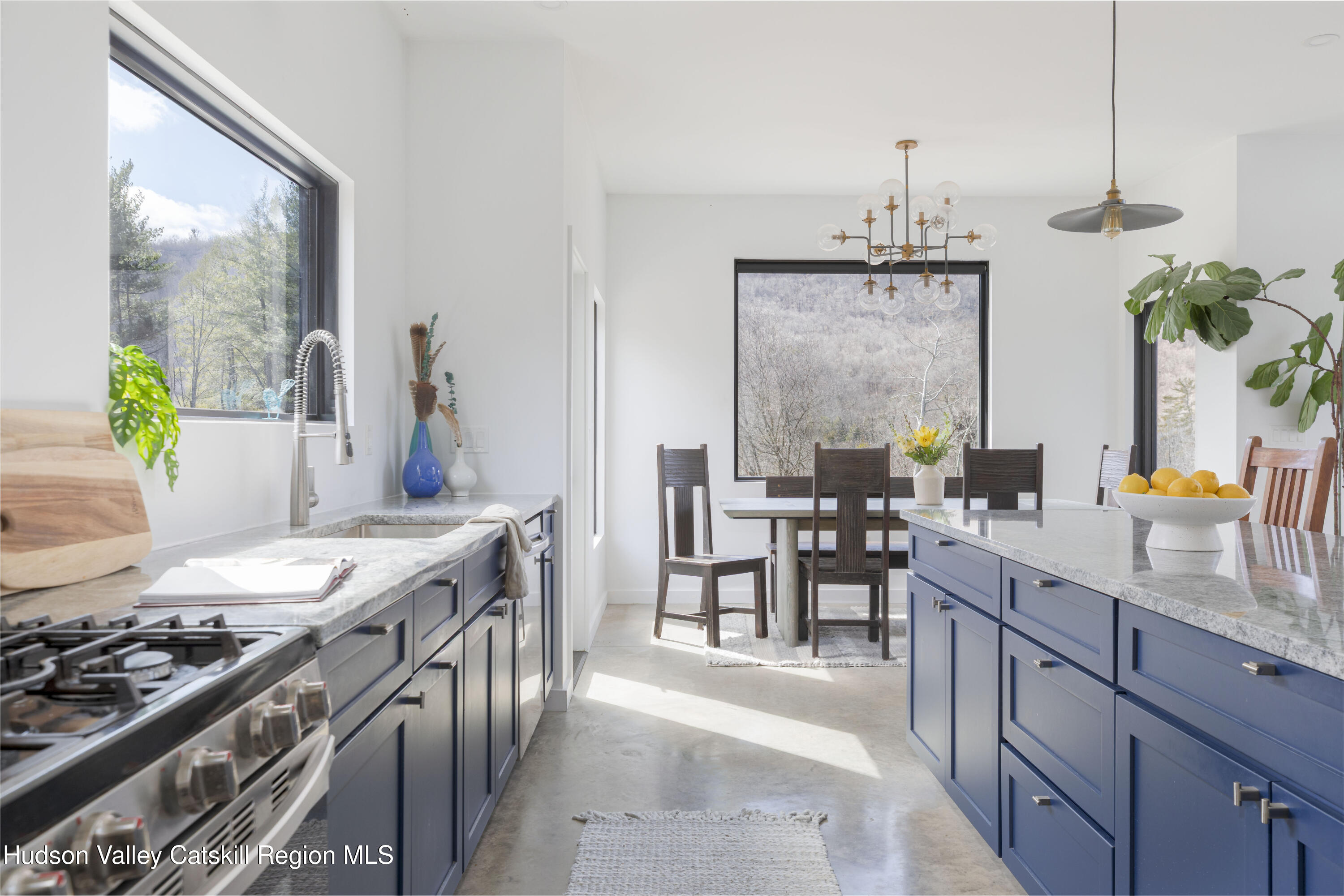 23 Traver Hollow Road Boiceville, NY 12412 - Photo 15 of 48 a kitchen with stainless steel appliances granite countertop a sink stove and refrigerator