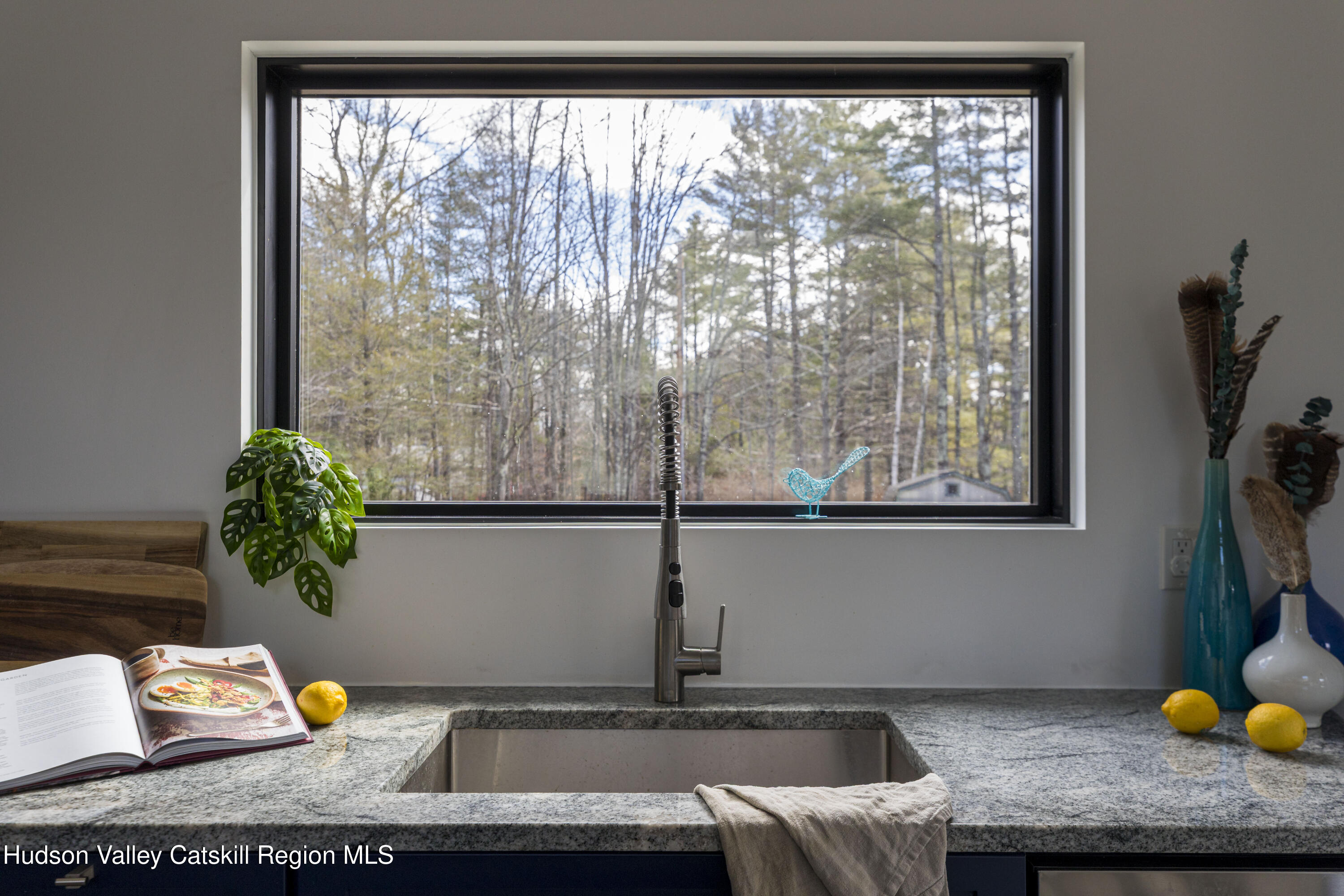 23 Traver Hollow Road Boiceville, NY 12412 - Photo 18 of 48 a view of a living room with a sink and a window