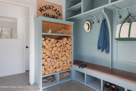 a view of an entryway with wooden floor