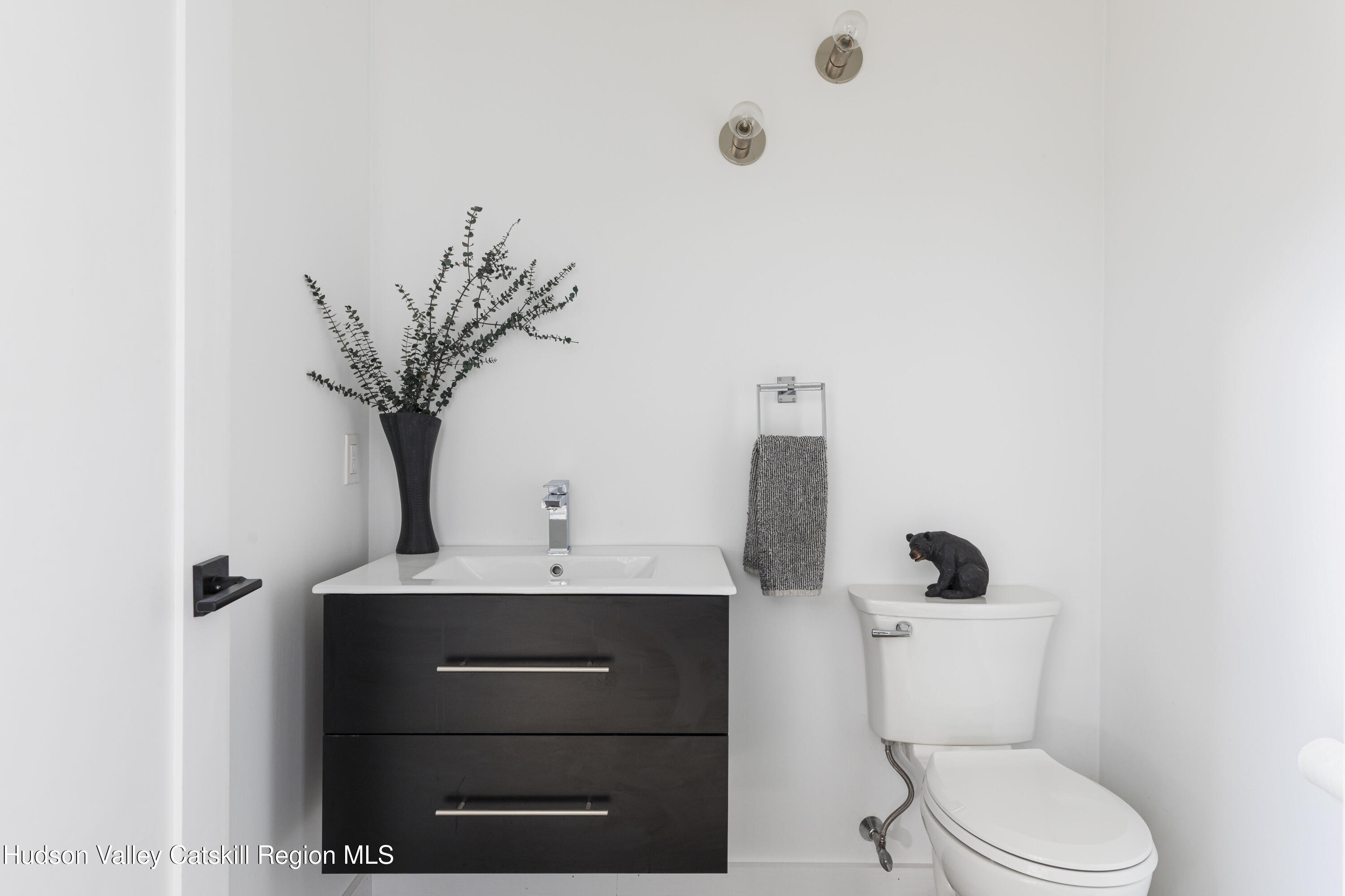 23 Traver Hollow Road Boiceville, NY 12412 - Photo 22 of 48 a bathroom with a toilet a sink and mirror