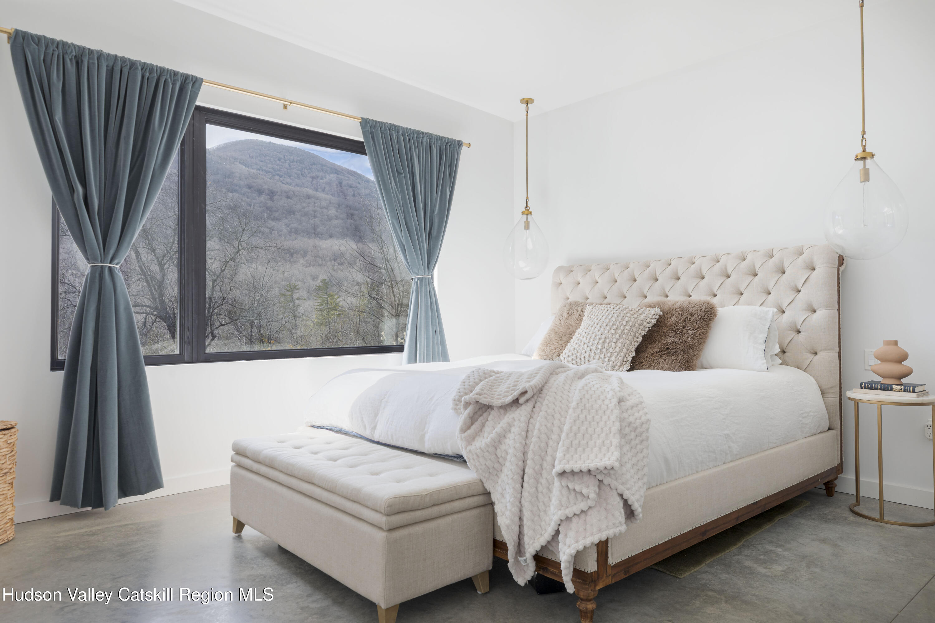 23 Traver Hollow Road Boiceville, NY 12412 - Photo 23 of 48 a bedroom with a bed lamp and a fireplace