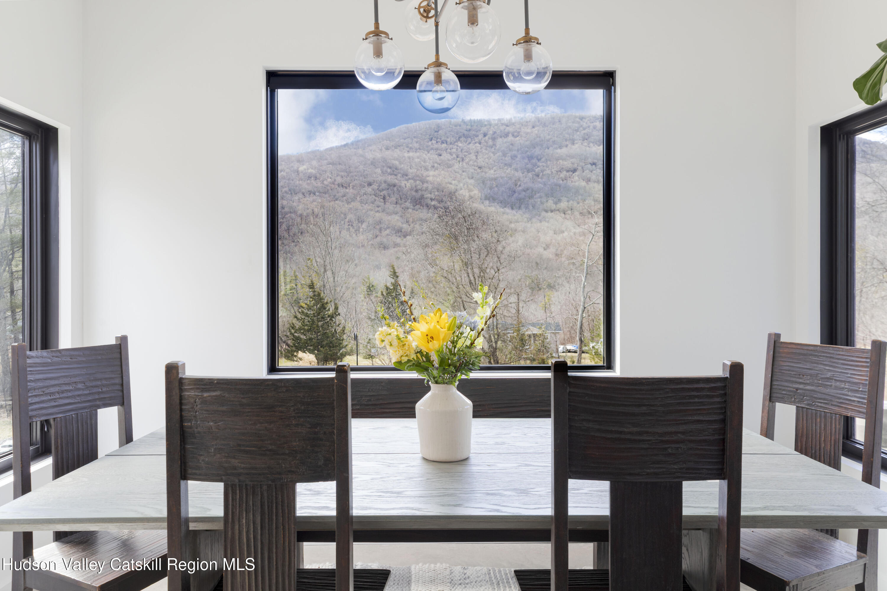 23 Traver Hollow Road Boiceville, NY 12412 - Photo 3 of 48 a view of a dining room with furniture and wooden floor