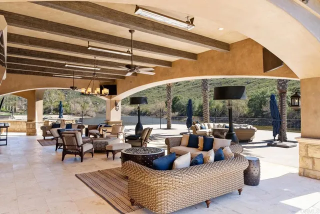 a living room with patio furniture