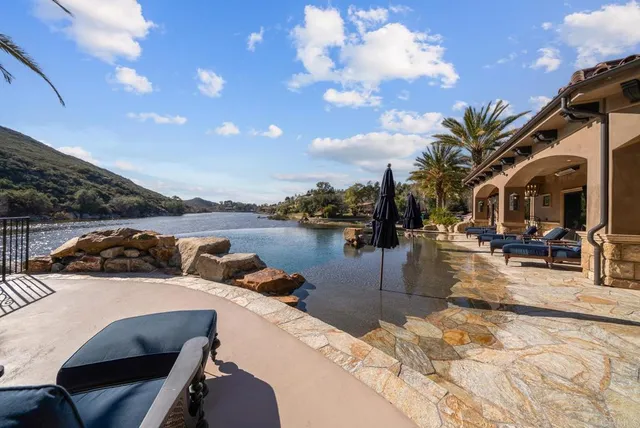 a view of a chairs and table in a patio