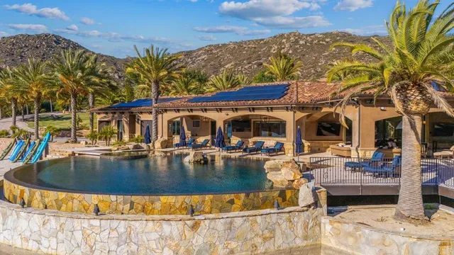 a view of a park with palm trees