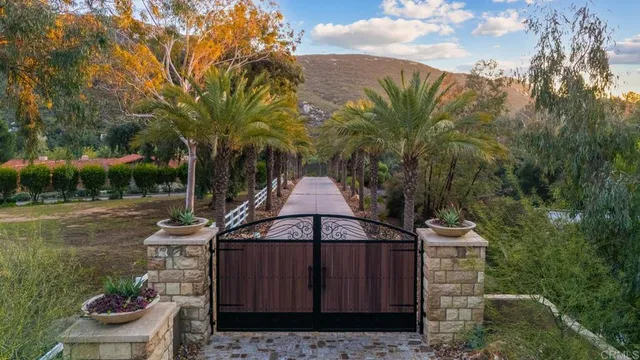 a kitchen with stainless steel appliances granite countertop a stove and a refrigerator